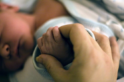 Holding Hands with a Newborn Baby