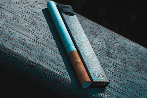 Juul Pod Mod and a Cigarette