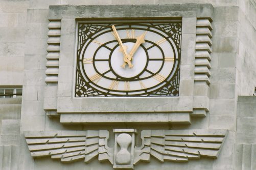 Detail of Clock at Broadcasting House in London, design by Eric Gill