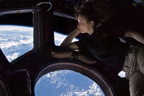 Looking out on the World, self-portrait from the International Space Station by Tracy Caldwell Dyson for NASA